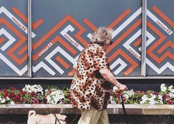 Elderly Woman Walking her Dog